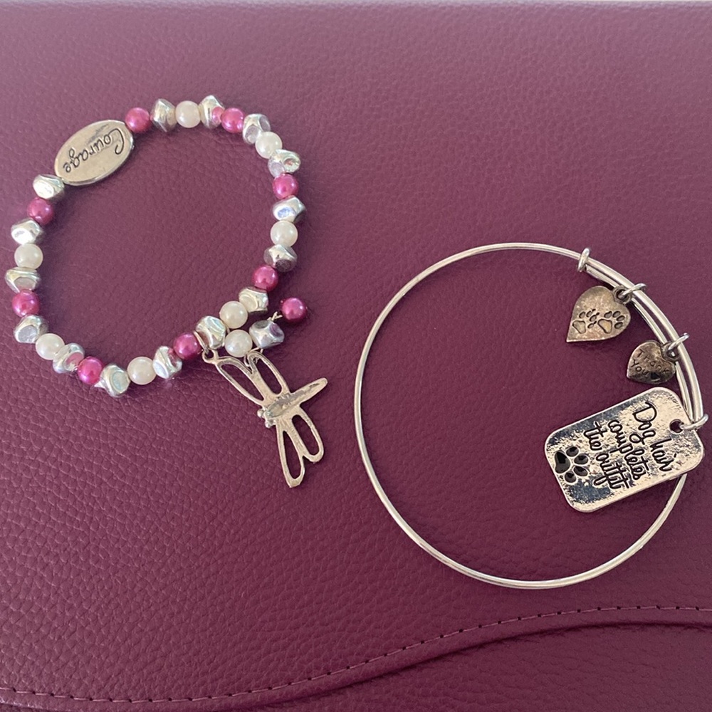 Two silver -ish bracelets
